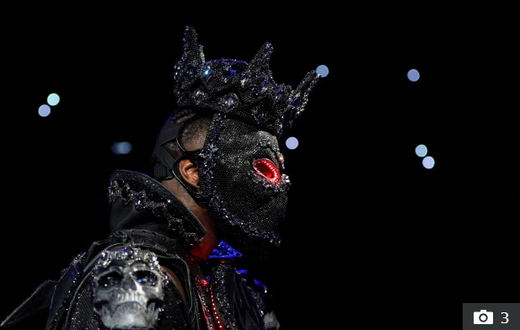Deontay Wilder wore a mask complete with glowing red eyes for his ring walk- Credit: Reuters