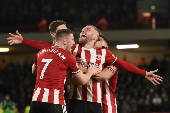 All smiles: Sheffield United are sixth in their first season back in the Premier League