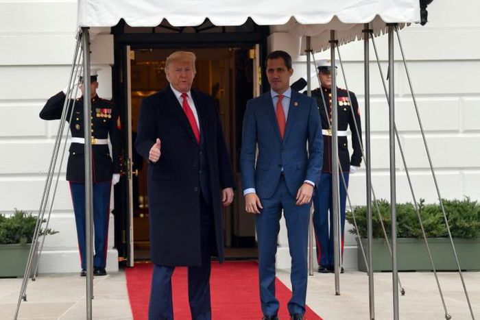 US President Donald Trump greets Venezuelan opposition leader Juan Guaido at the White House