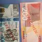 200 and 100 cedis notes
