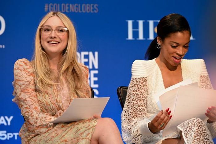 Actress Dakota Fanning (L) and Susan Kelechi Watson attend the 77th Annual Golden Globe Awards nominations announcement at the Beverly Hilton hotel in Beverly Hills on December 9, 2019