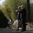 Chinese Ambassador Cui Tiankai (left) speaks to the director of the National Zoo, Dennis Kelly, as they wait for the departure of giant panda Bao Bao in February 2017