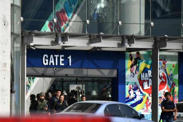 For hours a Thai soldier sought out victims in the Terminal 21 mall -- some of its windows spidered by bullet holes