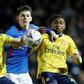 Won't stay if unwanted - Arsenal defender Sokratis Papastathopoulos (L) in FA Cup action against Portsmouth