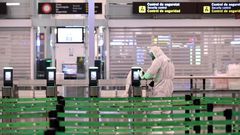 Members of Spain's Military Emergencies Unit (UME) carry out a general disinfection at Josep Tarradellas Barcelona-El Prat airport in El Prat de Llobregat on March 19, 2020
