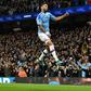 Algerian Riyad Mahrez leaps to celebrate scoring the second goal for Manchester City in a 2-1 win over Chelsea