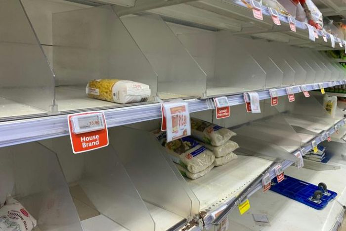 Singaporeans started stocking up after the city raised its coronavirus alert to orange, the second highest