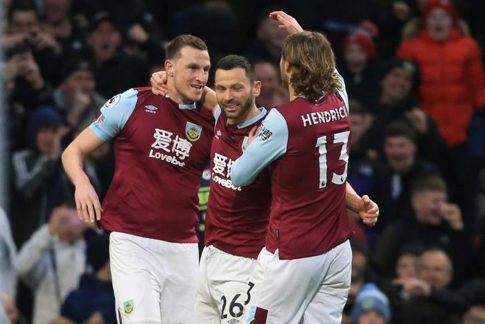 Burnley forward Chris Wood (left) celebrates his goal against Tottenham