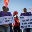 South African Airways workers and the airline are in talks to end a strike that has grounded hundreds of flights