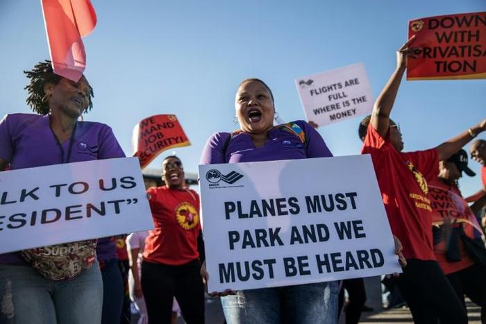 South African Airways workers and the airline are in talks to end a strike that has grounded hundreds of flights