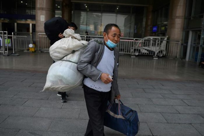 Many migrant workers in China have been forced to head back to rural areas after losing their jobs in cities