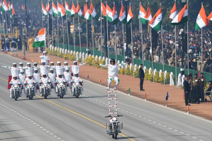 For the first time, the riders performing daredevil stunts on motorbikes to the delight of the crowds lining New Delhi's central Rajpath boulevard, were women