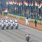 For the first time, the riders performing daredevil stunts on motorbikes to the delight of the crowds lining New Delhi's central Rajpath boulevard, were women