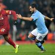 Liverpool deserve to be awarded the Premier League title even if the season is cancelled, says Manchester City star Ilkay Gundogan (right)