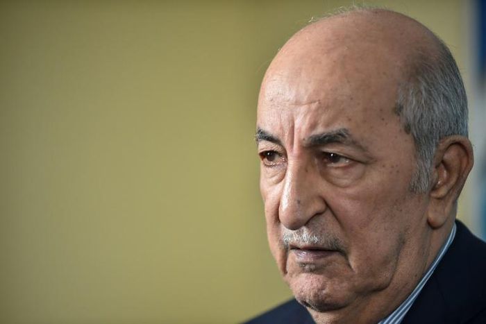 Algerian President Abdelmadjid Tebboune, seen here, said the arrest of his son was to "punish" him for his attack on oligarchs while premier
