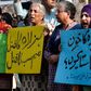 Pakistan human rights activists hold placards during a protest against a suicide blast targeting the Hazara ethnic minority in Lahore in  April 2019