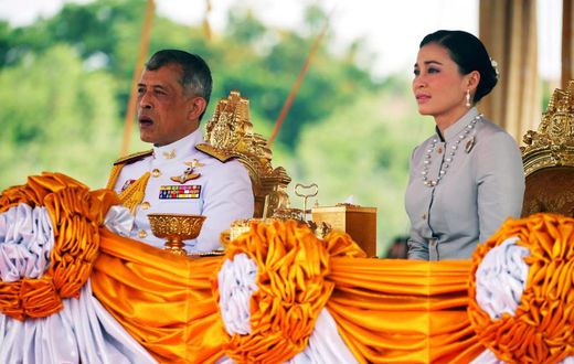 King of Thailand goes into isolation from coronavirus with 20 side chicks