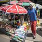 Stocking up: South Africans have rushed to buy long-life food and milk, snacks and toilet paper ahead of a three-week lockdown