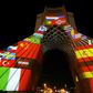 Tehran's Azadi (Freedom) Tower is lit up with national flags in solidarity with countries affected by the COVID-19 pandemic