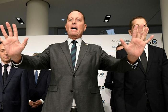 US Ambassador to Germany Richard Grenell (C, pictured February 14, 2020) said President Donald Trump told him that allies who use Huawei "will jeopardize our ability to share intelligence and information"