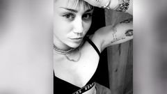 Miley Cyrus Shows Off Toned Abs While Doing Yoga