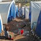 The hundreds of thousands of displaced civilians living in camps in rebel-held northwestern Syria do their best to protect themselves against the coronavirus but the tightly spaced tents and intermittent water supply make it difficult