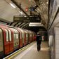 A London Underground station was almost deserted as Britain introduces tougher restrictions over the coronavirus