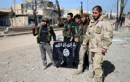 Turkish-backed Syrian fighters take down a black Islamic State group flag during their capture of the northern town of Al-Bab in February 2017