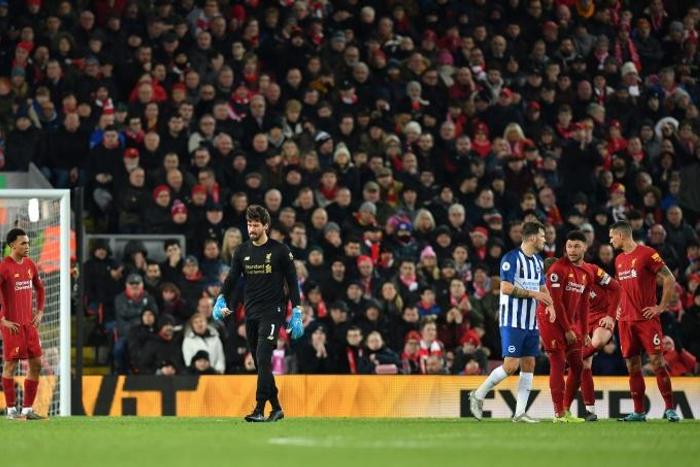 Liverpool held on for a 2-1 win over Brighton despite goalkeeper Alisson being sent off with under a quarter-of-an-hour remaining