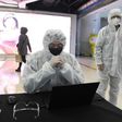 While measures can be taken to reduce the spread of the coronavirus, like having security guards wearing hazmat suits check the temperature of shoppers at a Beijing mall, the epidemic is having an effect the economy