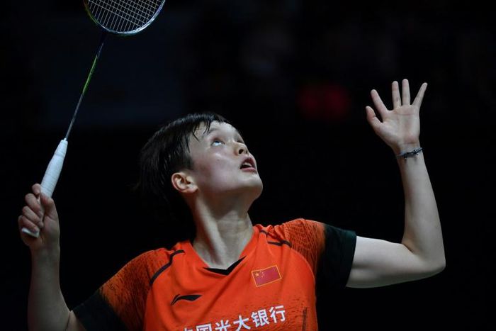 Players like China's Wang Zhiyi, pictured during the Indonesia Masters badminton tournament, will have to wait to play in the postponed China Masters