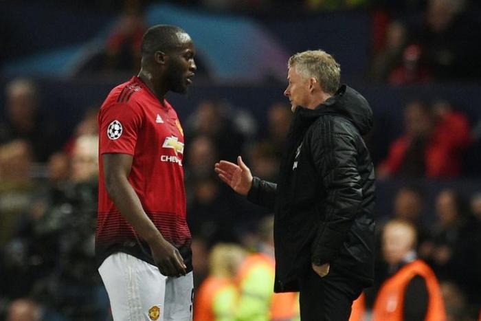 Former Manchester United forward Romelu Lukaku speaks to manager Ole Gunnar Solskjaer