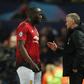 Former Manchester United forward Romelu Lukaku speaks to manager Ole Gunnar Solskjaer