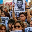 People demonstrate outside the Congress building in Buenos Aires to demand justice for the killers of 18-year-old Fernando Baez