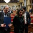 Catalan president Quim Torra (2L) leaves a plenary session of the parliament of Catalonia on January 27, 2020 in Barcelona
