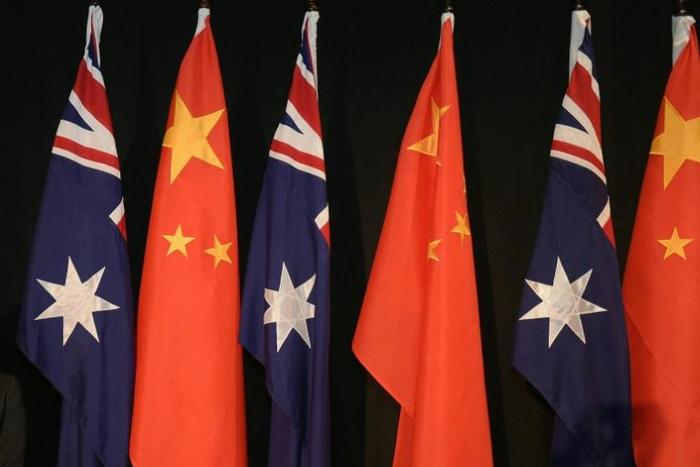 The defection of the apparent spy could cause further tension between Australia and China