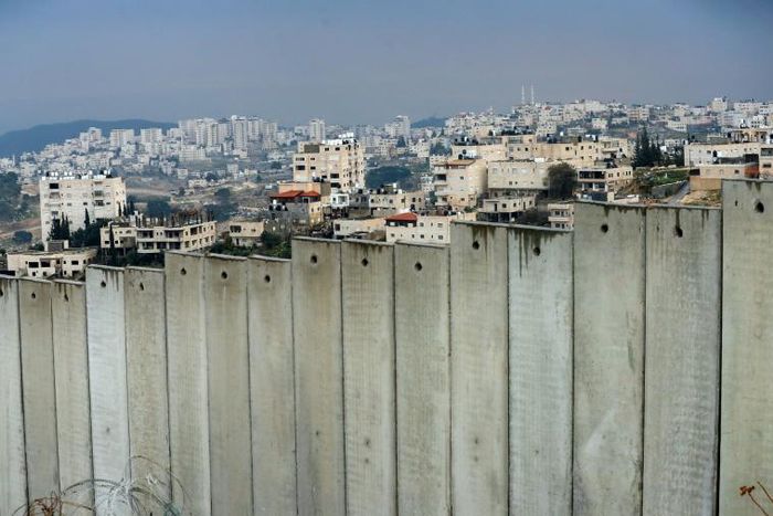 The occupied West Bank village of al-Eizariya lies behind Israel's controversial separation barrier on the outskirts of East Jerusalem