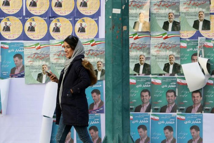 Commentators expect disillusionment among voters in sanctions-hit Iran to result in a low turnout in Friday's parliamentary election despite government appeals for a show of unity