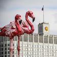 Flamingo statues stand in front of Russia's government building as the ruble tumbled on March 9 to a four-year low amid a crash in oil prices