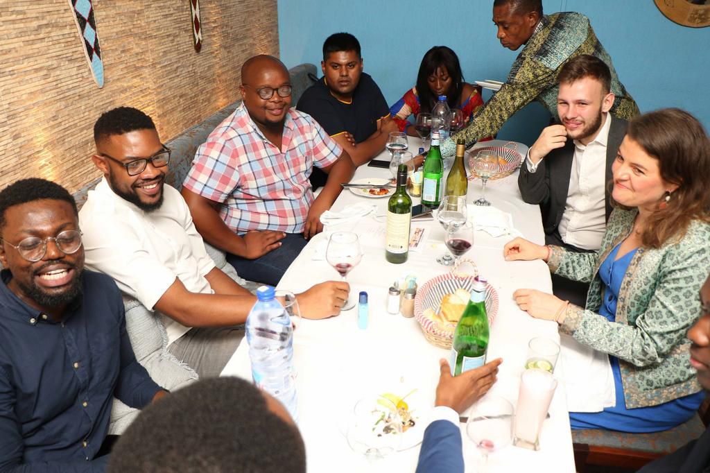 Pulse Ghana team members interacting with guests