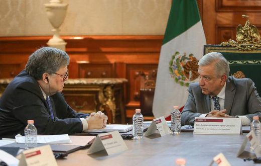 A photo released by the Mexican presidency shows President Andres Manuel Lopez Obrador (R) and US Attorney General Bill Barr during a meeting at the Palacio Nacional, in Mexico City on December 5, 2019