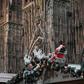 A worker installs decorations at the market, which will see a beefed up security presence this year