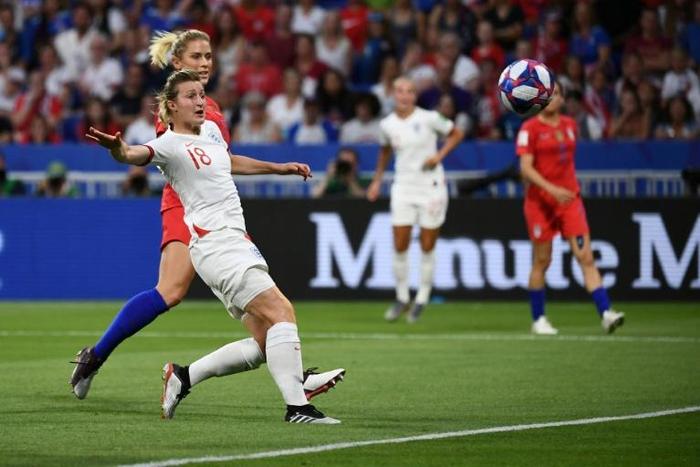 England forward Ellen White scores during the World Cup semi-final defeat to the United States last year