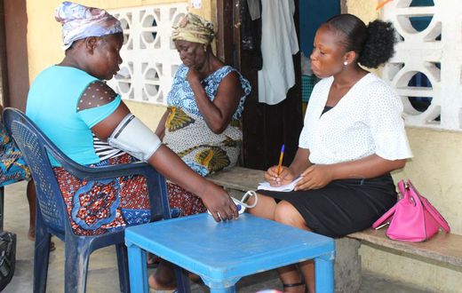 Pregnant women receive treatment on plastic chairs (File photo)