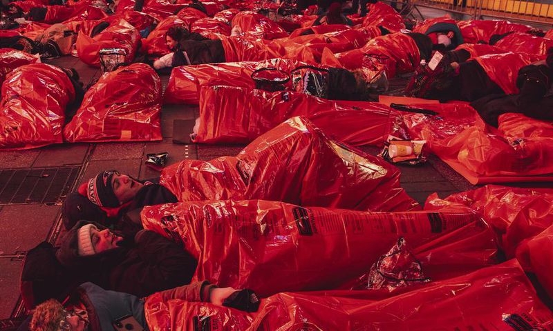 Hundreds Spend the Night in Sleeping Bags on Times Square