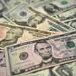 US bank notes. The bank robber reportedly shouted 'Merry Christmas' and threw the stolen cash in the air