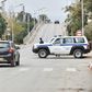 Police cars block access to a road near a courthouse in the Algerian city of Blida where the appeal hearing was held