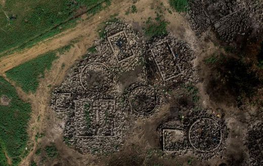 The ethnic conflict has destroyed villages in a spiral of violence, like the Fulani village of Sadia-Peulh, seen here from the air