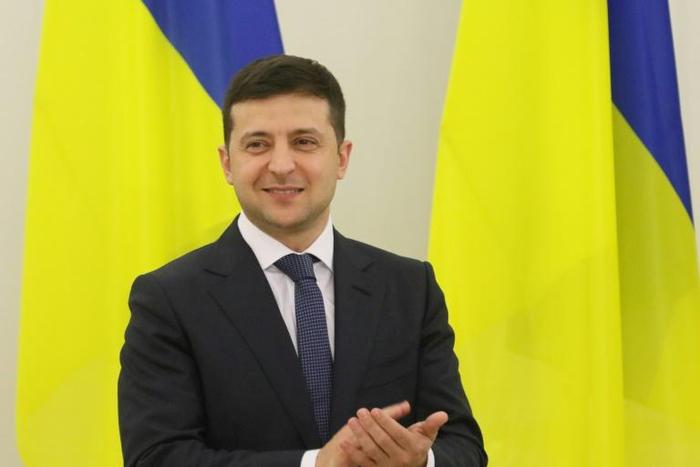 Putin and Zelensky are likely to have a one-on-one meeting during the four-way summit talks in Paris next Monday; pictured is Ukrainian President Volodymyr Zelensky in Vilnius, November 27, 2019