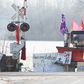 A First Nations protester walk in front of a snow plow blade that has signatures from the  Wetʼsuwetʼen hereditary chiefs as part of a train blockade in Tyendinaga, near Belleville, Ontario, Canada on February 21, 2020